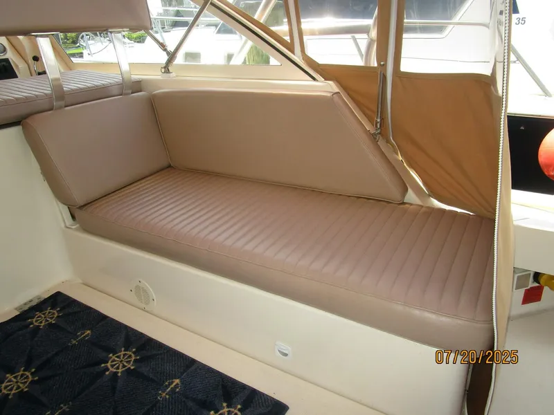 Slide: The Image of 34' Mainship upper deck starboard aft seating - 5509414