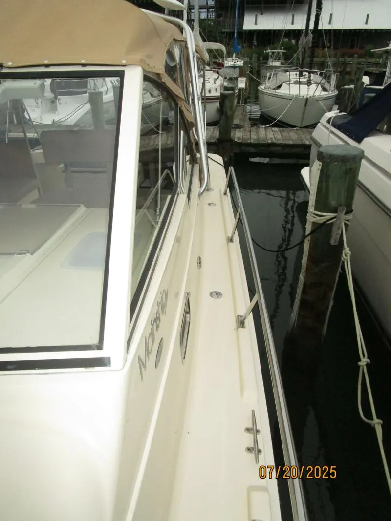 Slide: The Image of 34' Mainship port side deck - 5509394