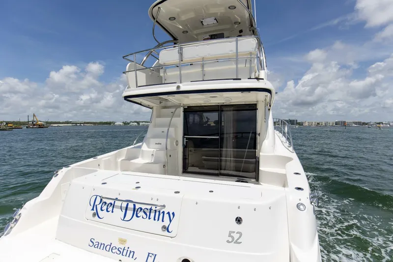 Slide: The Image of 2007 52 Sea Ray Sedan Bridge Reel Destiny Stern - 5573613