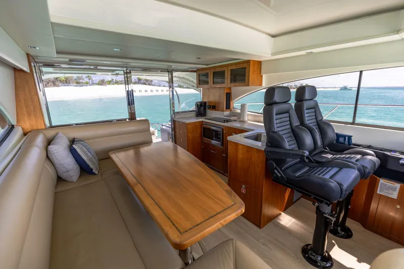 Slide: The Image of 2018 Riviera 4800 Sport Yacht- Runaway Island- Dinette - 5539048