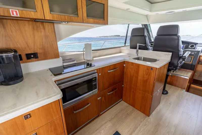 Slide: The Image of 2018 Riviera 4800 Sport Yacht- Runaway Island- Galley - 5539053