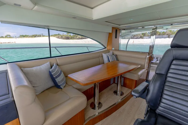 Slide: The Image of 2018 Riviera 4800 Sport Yacht- Runaway Island- Dinette - 5539050