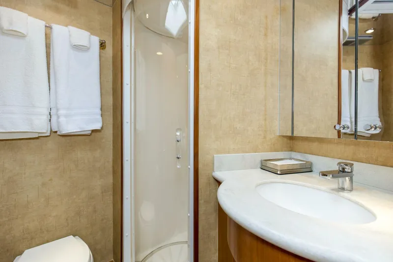 Slide: The Image of 2007 68 Hatteras 68 Enclosed Bridge REFUGE Forward VIP Head (1) - 5535527