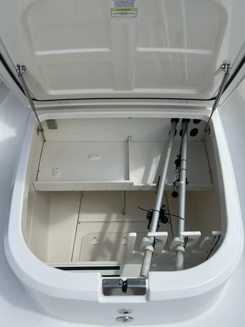 Slide: The Image of 2014 Boston Whaler 350 Outrage Console Lounger Interior Storage - 5576095