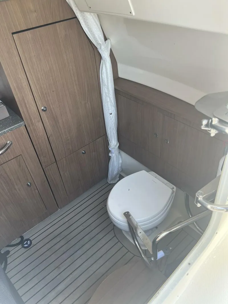 Slide: The Image of 2014 Boston Whaler 350 Outrage Console Interior & Head - 5576101
