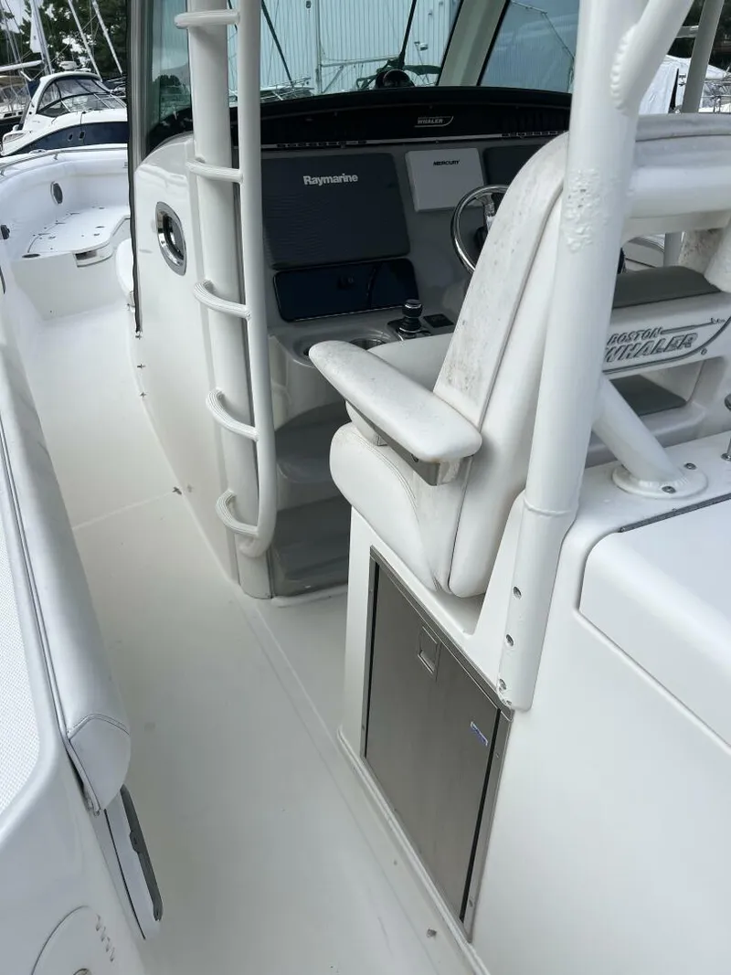 Slide: The Image of 2014 Boston Whaler 350 Outrage looking up port gunnel - 5576118
