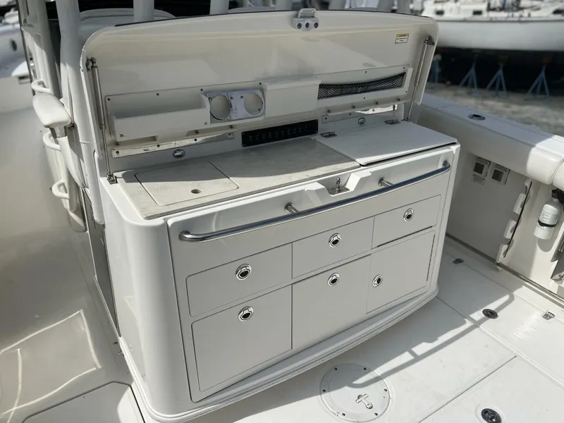 Slide: The Image of 2014 Boston Whaler 350 Outrage Summer Kitchen Leaning Post open, looking from port side - 5576109