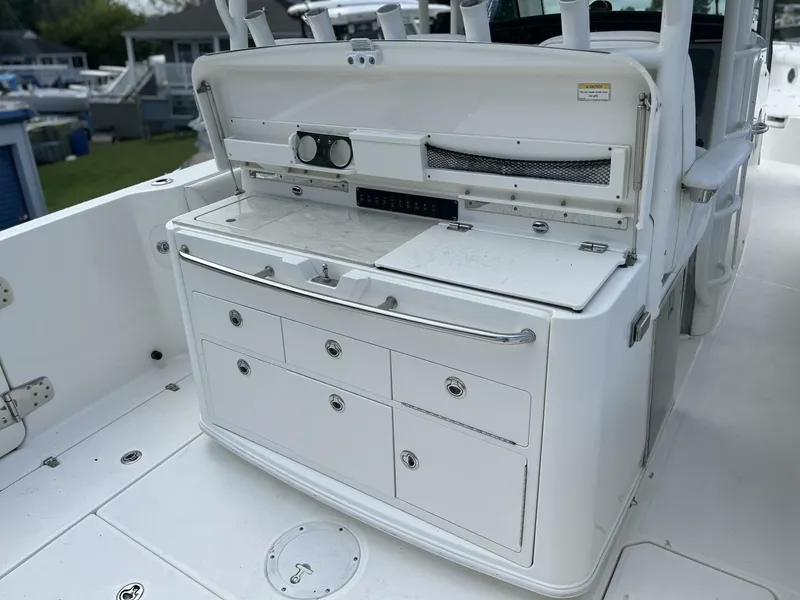 Slide: The Image of 2014 Boston Whaler 350 Outrage Summer Kitchen Leaning Post open, looking from starboard side - 5576112