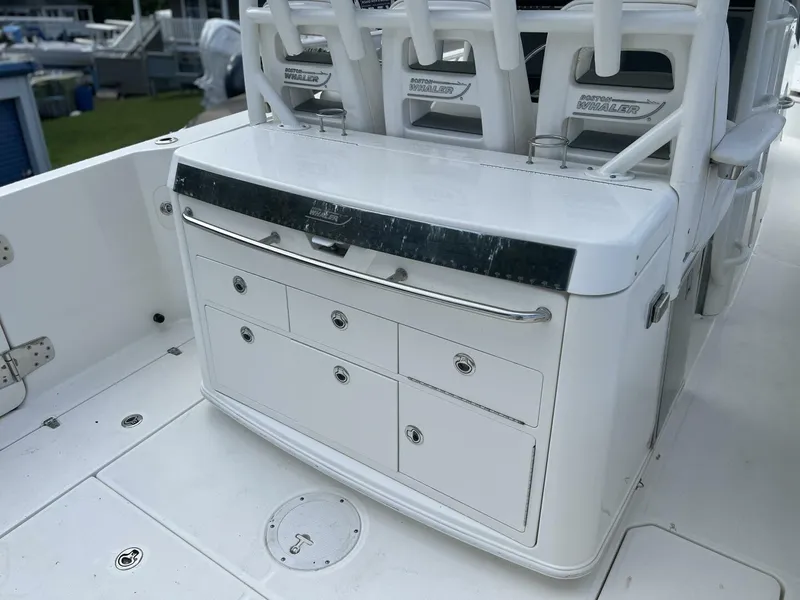 Slide: The Image of 2014 Boston Whaler 350 Outrage Summer Kitchen Leaning Post closed, looking from starboard side - 5576113