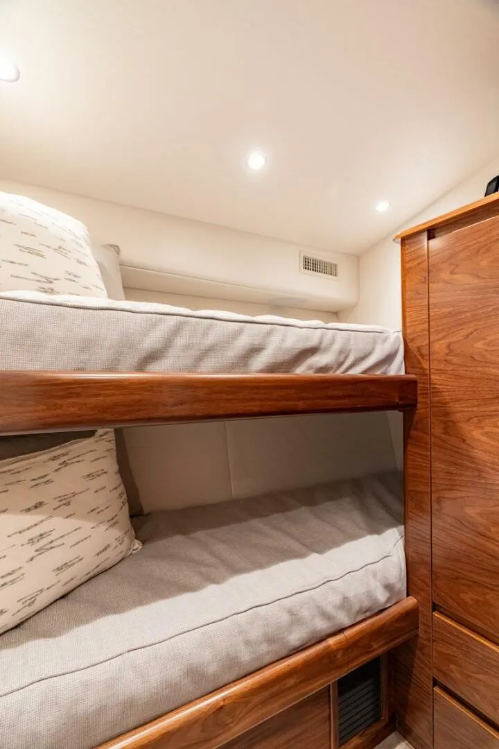 Slide: The Image of Viking 54 Sport Tower - Bunk Stateroom 2026 Viking 54 Sport Tower - 5570102