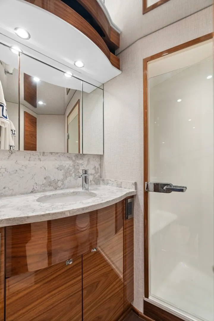 Slide: The Image of Viking 58 - Master Ensuite Head 2025 Viking 58 Convertible - 5553422