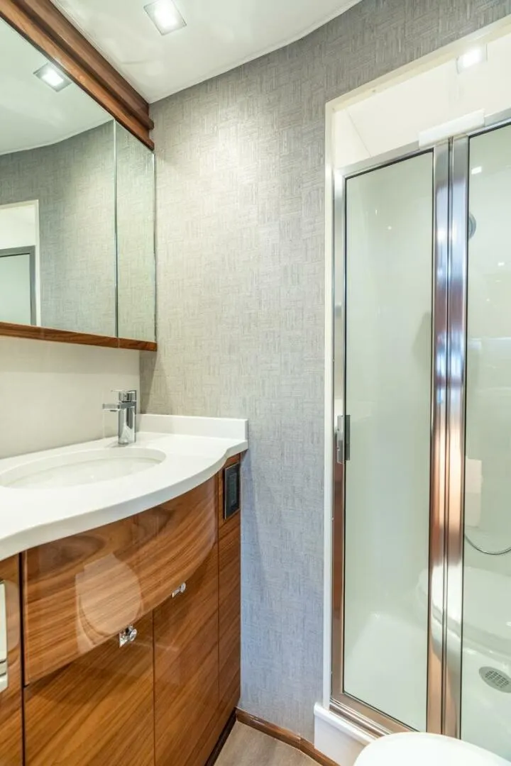 Slide: The Image of Viking 64 - Ensuite Head 2025 Viking 64 Convertible - In-Stock 64-739 - 5553518