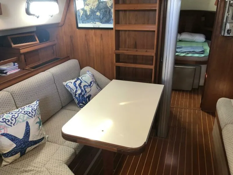 Slide: The Image of Island Packet 380 Standard table opens over custom table - 5554657