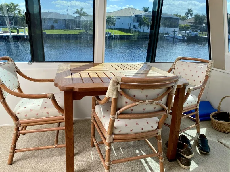 Slide: The Image of Aft Deck Table and Chairs - 5578488