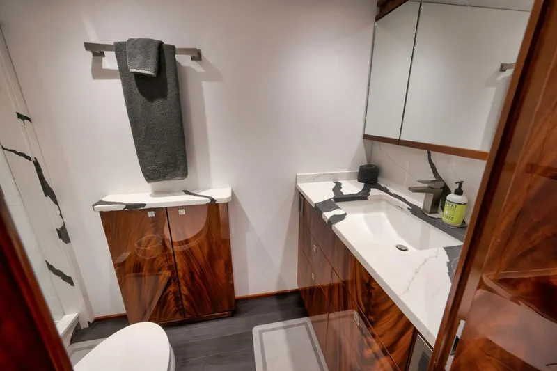 Slide: The Image of 2025 Viking 90 Convertible- NIKKI BELLA- Master Stateroom Head - 5592744