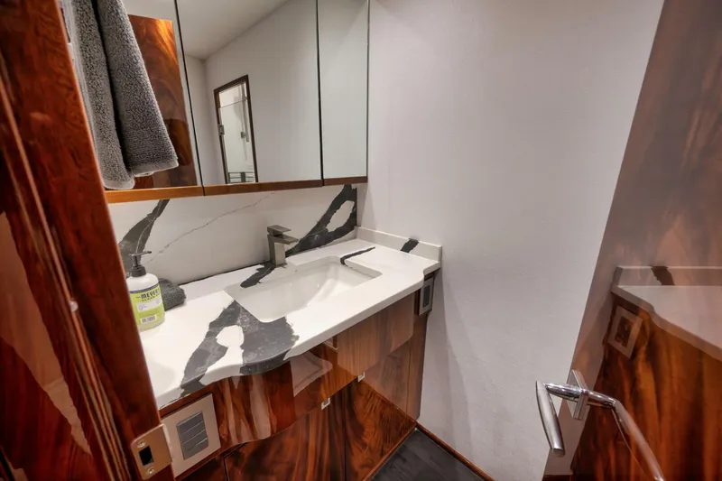 Slide: The Image of 2025 Viking 90 Convertible- NIKKI BELLA- Forward Stateroom Head - 5592582