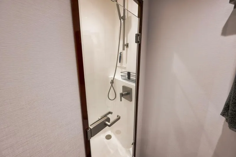 Slide: The Image of 2025 Viking 90 Convertible- NIKKI BELLA- Forward Stateroom Head - 5592584