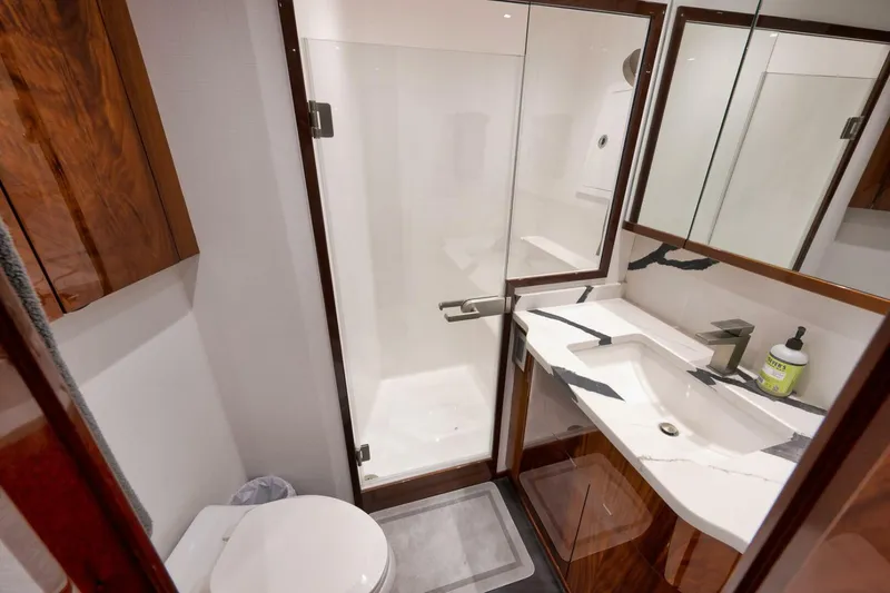 Slide: The Image of 2025 Viking 90 Convertible- NIKKI BELLA- Starboard Stateroom Head - 5592753