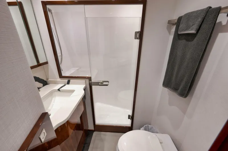 Slide: The Image of 2025 Viking 90 Convertible- NIKKI BELLA- Port Stateroom Head - 5592756