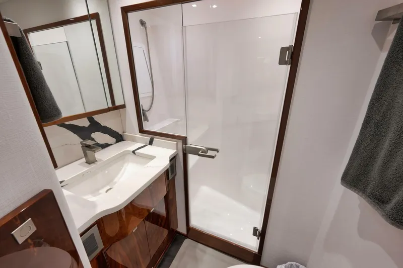 Slide: The Image of 2025 Viking 90 Convertible- NIKKI BELLA- Port Stateroom Head - 5592757