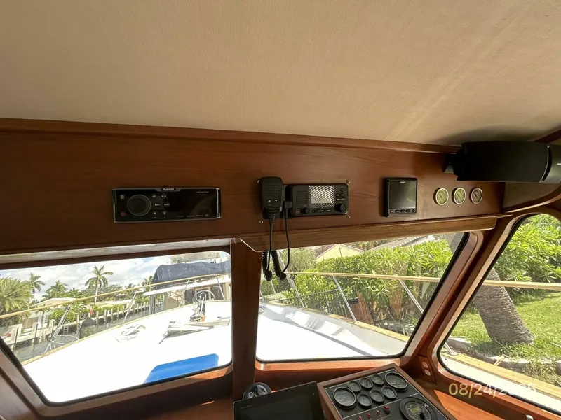 Slide: The Image of 48' DeFever lower helm overhead electronics2 - 5592240