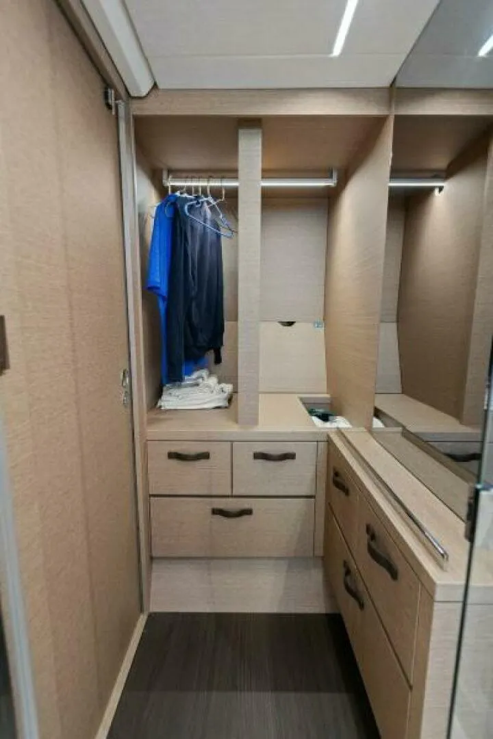 Slide: The Image of 2022 59 Prestige Flybridge - How Sweet It Its - Master Storage - 5592150