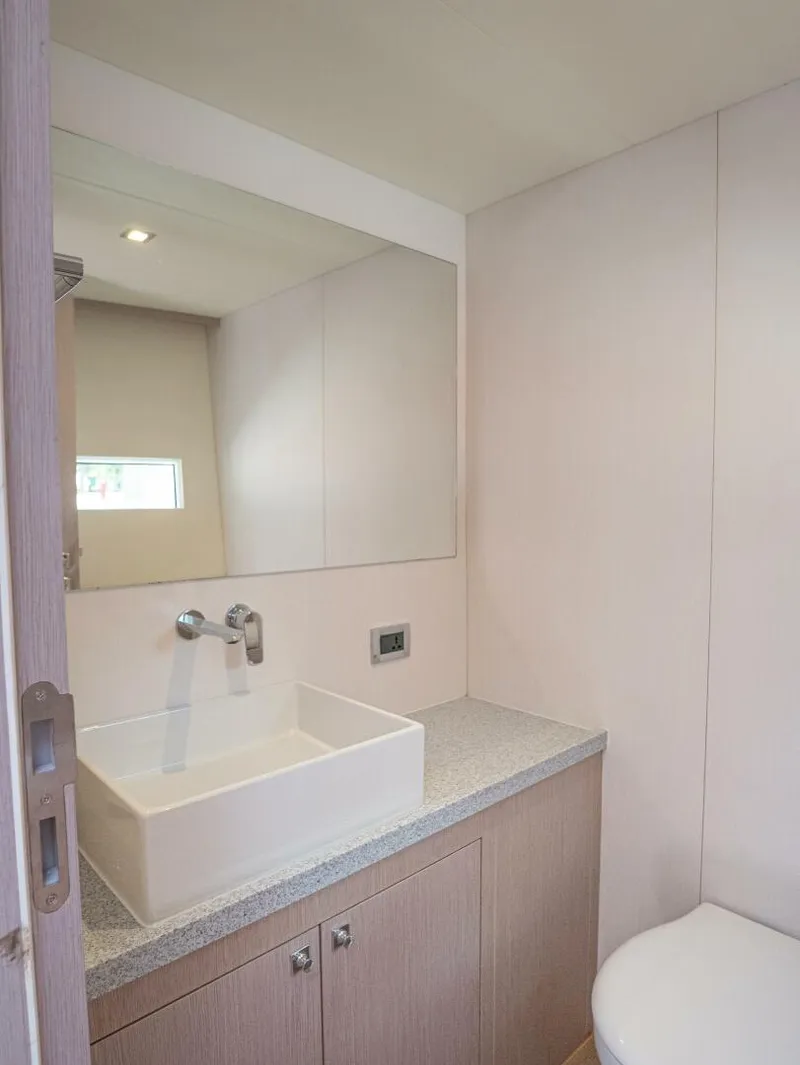 Slide: The Image of Alva OE 54 Master Water Closet With Vanity Ocean Eco 54 master bathroom with vanity and contemporary fixtures - 5603812