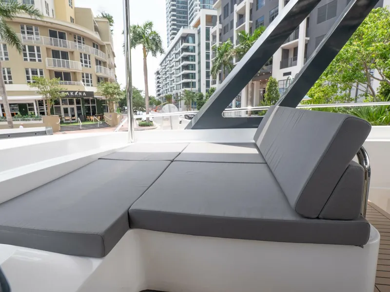 Slide: The Image of Alva OE 54 Flybridge Lounge Area On Starboard Ocean Eco 54 flybridge starboard lounge area with teak table - 5603833