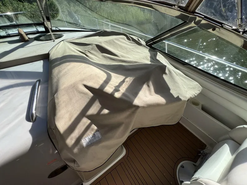 Slide: The Image of 2002 Sea Ray 360 Sundancer Helm with Cover on - 5645770