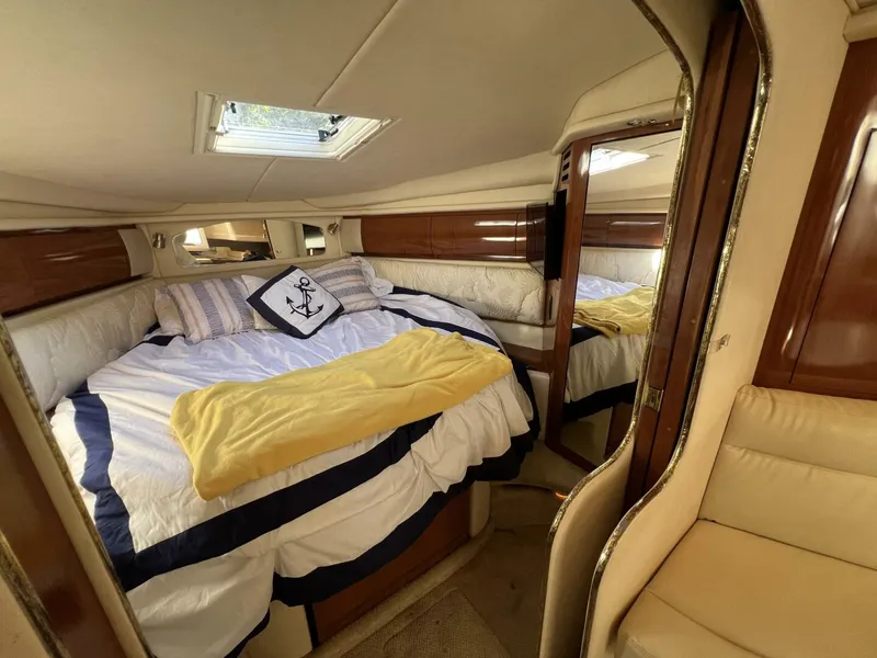 Slide: The Image of 2002 Sea Ray 360 Sundancer Forward V-Berth looking to Starboard - 5645780