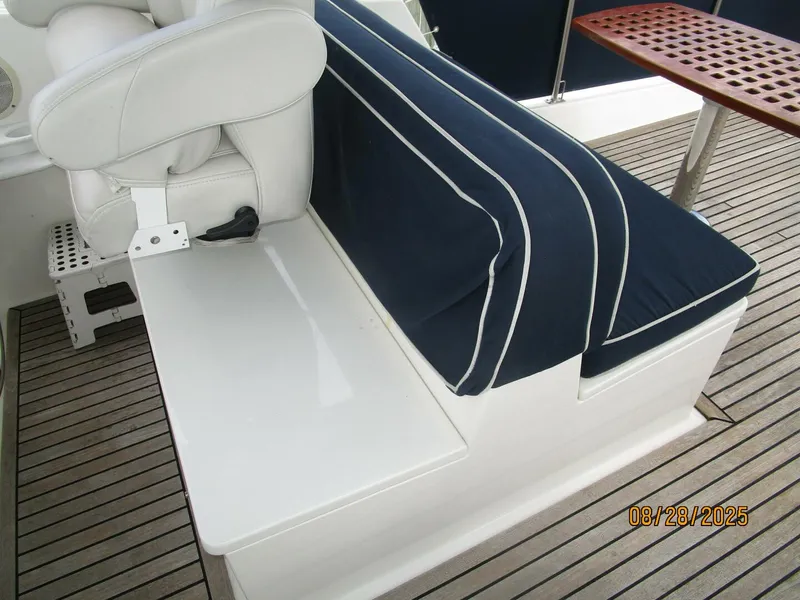 Slide: The Image of 42' Grand Banks flybridge starboard forward seating - 5614226