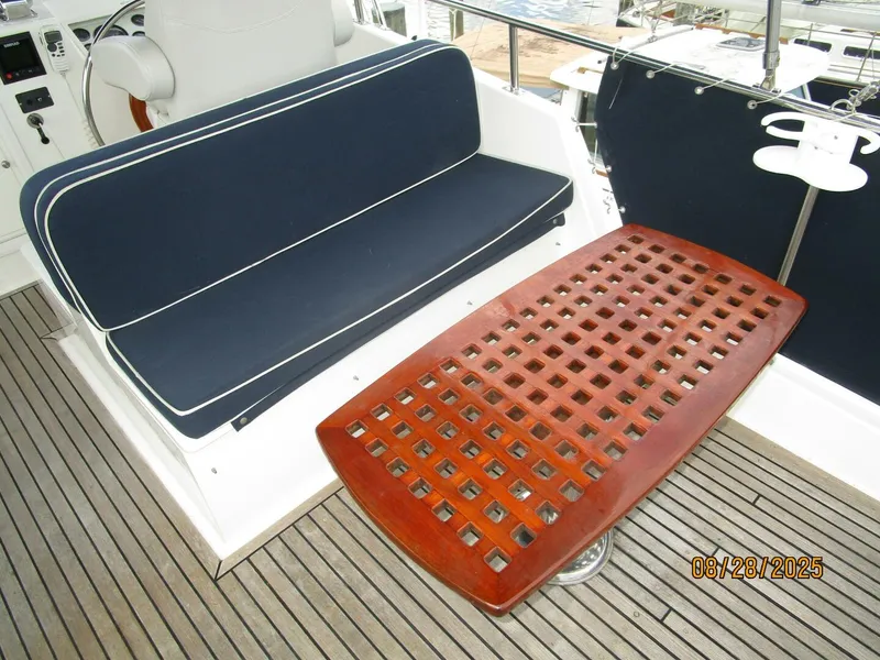Slide: The Image of 42' Grand Banks flybridge starboard aft seating - 5614224