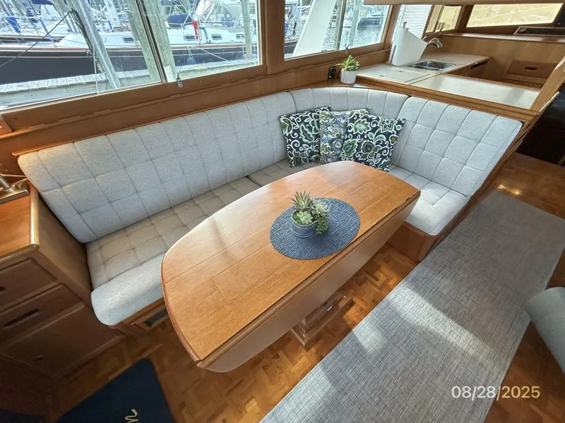 Slide: The Image of 42' Grand Banks salon port seating - 5615597