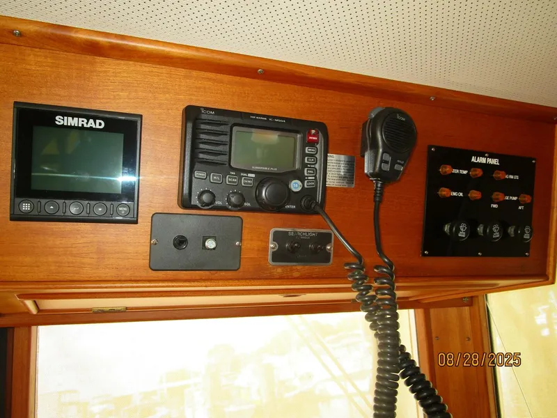 Slide: The Image of 42' Grand Banks lower helm overhead electronics1 - 5615573