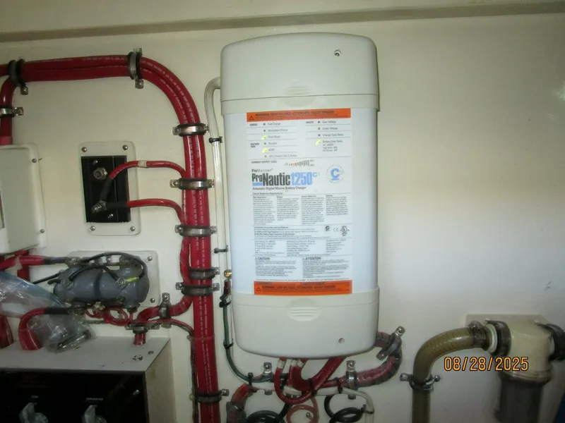 Slide: The Image of 42' Grand Banks battery charger - 5614211