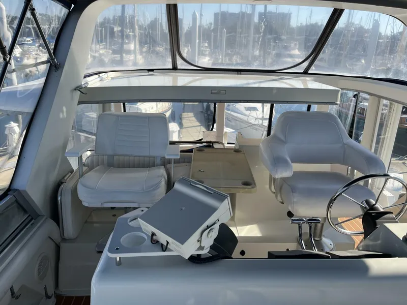 Slide: The Image of Carver 440 Aft Cabin Helm Station with Helm Chairs - 5733458