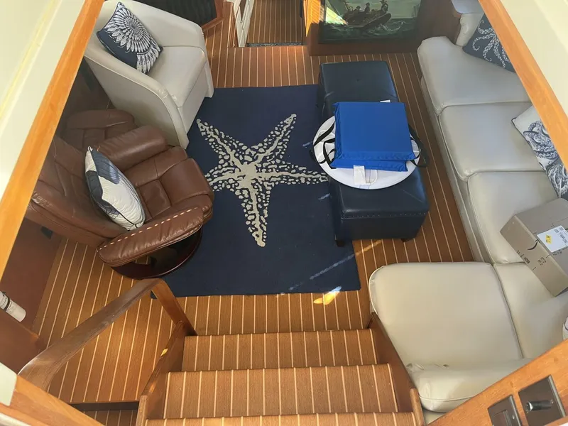 Slide: The Image of Carver 440 Aft Cabin Aft Deck looking down into the Salon - 5733494