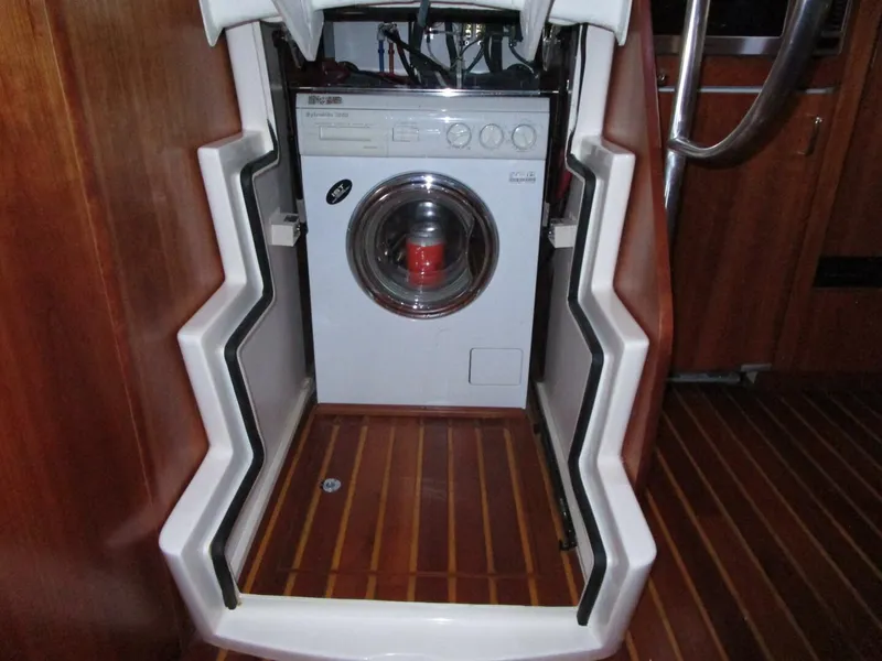 Slide: The Image of Washer & Dryer Under Steps - 5728324