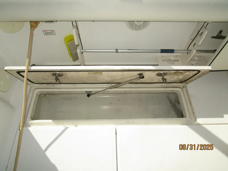 Slide: The Image of 31' Boston Whaler cockpit starboard storage - 5623964