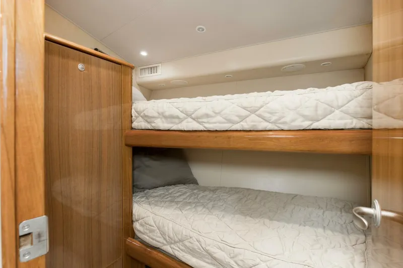 Slide: The Image of 2007 64 Viking Enclosed Bridge Reel Blues Forward Starboard Stateroom - 5641866