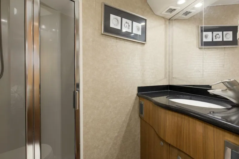 Slide: The Image of 2007 64 Viking Enclosed Bridge Reel Blues Forward Stateroom Head - 5641870