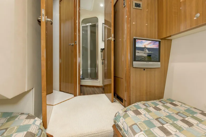 Slide: The Image of 2007 64 Viking Enclosed Bridge Reel Blues Rear Starboard Stateroom (2) - 5641871