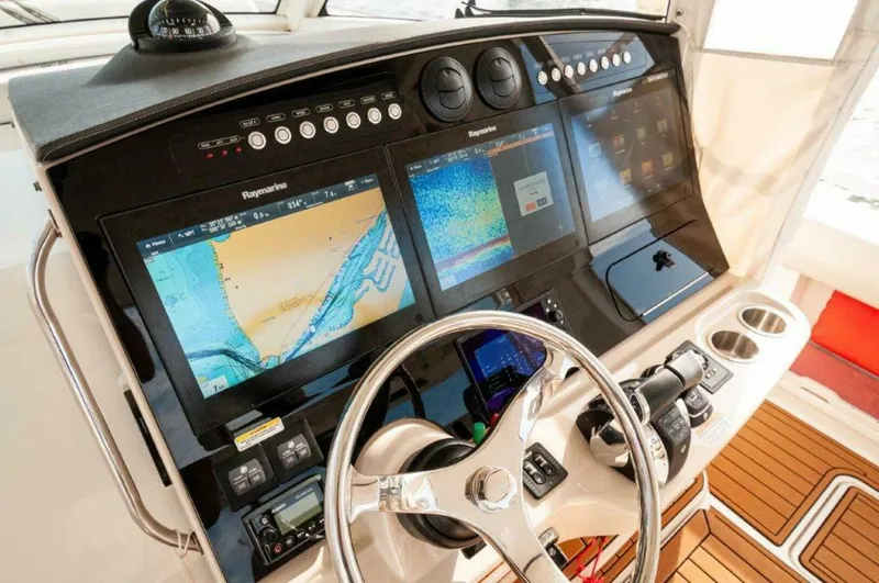 Slide: The Image of 2018 42 Boston Whaler 420 Outrage The Tyder II Helm (2) - 5661210