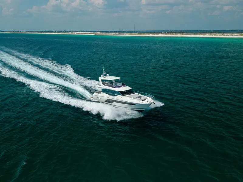 Slide: The Image of 2019 Prestige 590 Fly 'New Heart' - Profile Starboard 3/4 Bow  - 5681176