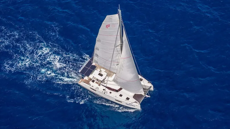 Slide: The Image of Happy Here    Sailing With Jib Overhead 1 - 5676421