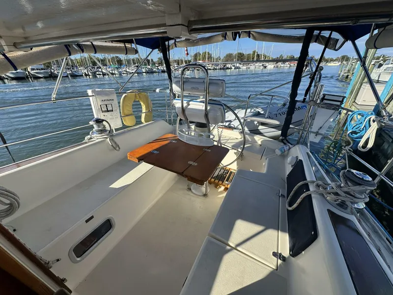 Slide: The Image of Cockpit with open table 2005 Caliber 40 LRC cockpit with open teak table - 5739378