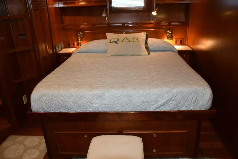 Slide: The Image of Comfortable berth with reading light and drawer storage beneath and in nightstand to either side of the bed - 5711508
