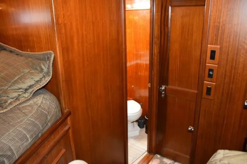 Slide: The Image of Guest stateroom private entry door to Guest head, stateroom door closed. - 5711518