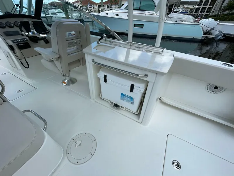 Slide: The Image of Boston Whaler 27 DC- Cockpit/Helm Storage 2019 Boston Whaler 270 Vantage DC - 5718255