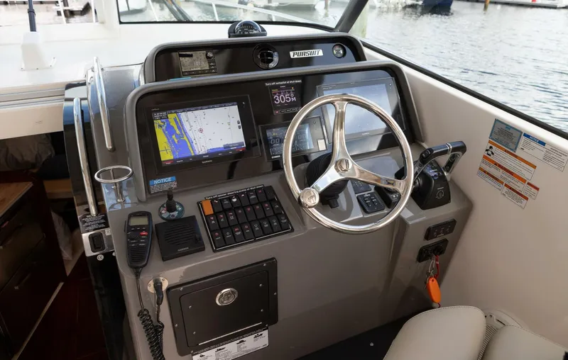 Slide: The Image of Pursuit 38 - TRACKER - Helm Station 2018 Pursuit 38 Center Console TRACKER - 5725389